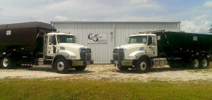 Cumberland Services Trucks with Roll-off and Compactor Containers