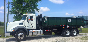 Cumberland Services roll-off truck leaving facility