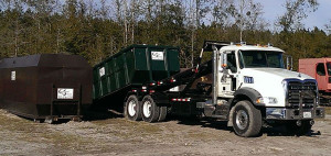 CS Truck Drop-off of Roll-off Container and Compactor